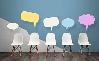 chairs and speech bubble suggesting panel discussions