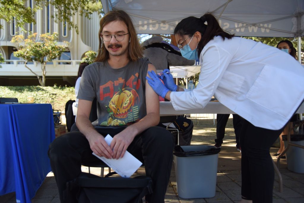 Student getting vaccinated